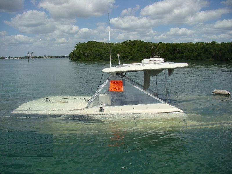 abandoned powerboat after Hurricane Charlie