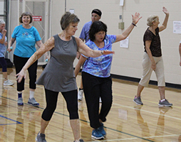 People Participating in Walking Fitness Program