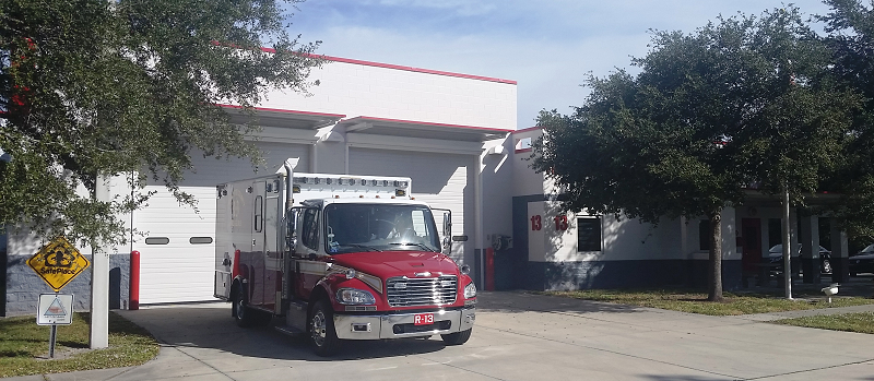 Station 13 with ambulance on driveway